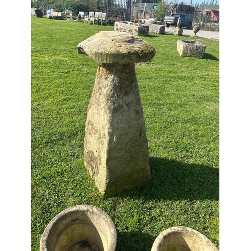 671 - Rare and important set of six tall natural stone staddle stones, the largest 140cm high

Situated at... 