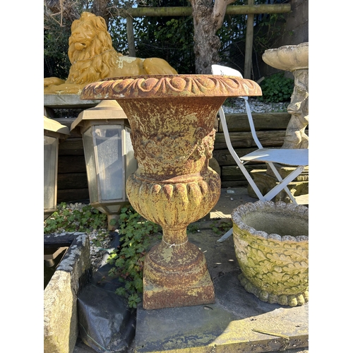 676 - 19th century cast iron half fluted campana urn with floral relief band, H 75cm x Dia 57cm

Situated ... 