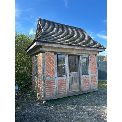 675 - Incredible two storey quaint Tudor style red brick summer house, with insulated elm and oak interior...