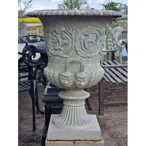 173 - After Andrew Handyside - Antique cast iron garden urn with scrolling floral relief and face mask det... 