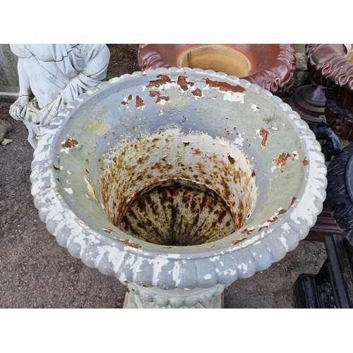 173 - After Andrew Handyside - Antique cast iron garden urn with scrolling floral relief and face mask det... 