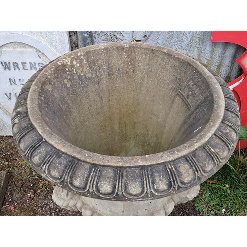 168 - Large reconstituted stone garden urn with fruiting grape vine relief, egg and darted rim and face ma... 