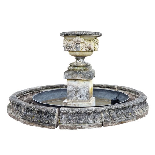 336 - Haddonstone - Exceptional weathered reconstituted stone water feature, the central urn with repeatin... 