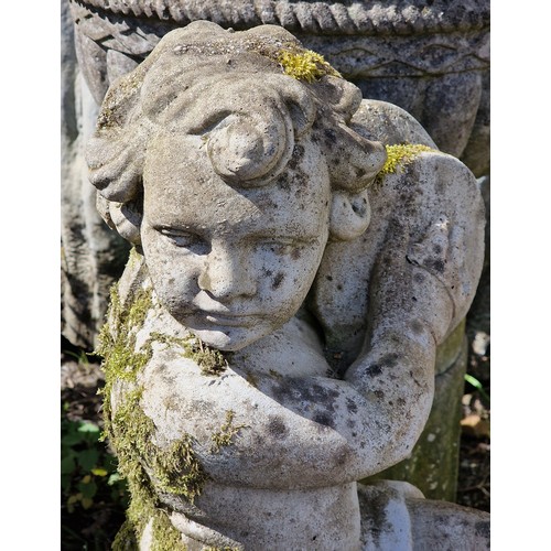 160 - Pair of weathered reconstituted stone garden statues of musical cherubs seated on ball pier caps, on... 