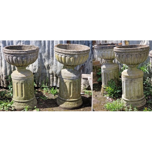 161 - Haddonstone - Set of four weathered reconstituted stone garden urns with lobed bowls, raised on flut... 