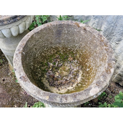 161 - Haddonstone - Set of four weathered reconstituted stone garden urns with lobed bowls, raised on flut... 