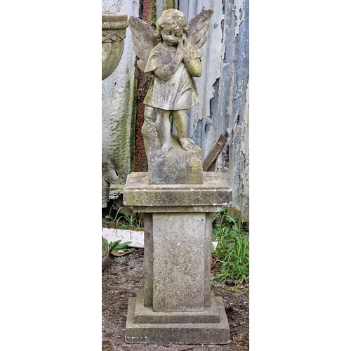 164 - Weathered marble angel statue raised on a reconstituted stone plinth, H 96cm x W 31cm x D 25cm