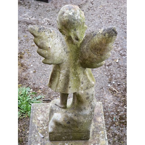 164 - Weathered marble angel statue raised on a reconstituted stone plinth, H 96cm x W 31cm x D 25cm