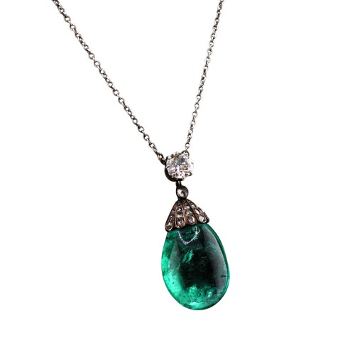 4 - An antique emerald and diamond pendant necklace, the drop-shaped emerald suspended from a rose diamo... 