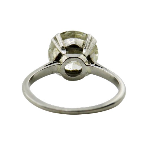 8 - A diamond solitaire ring, the early modern round brilliant approx. 3.25cts, in a twin four-claw sett... 