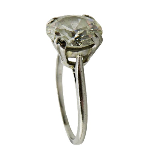 8 - A diamond solitaire ring, the early modern round brilliant approx. 3.25cts, in a twin four-claw sett... 