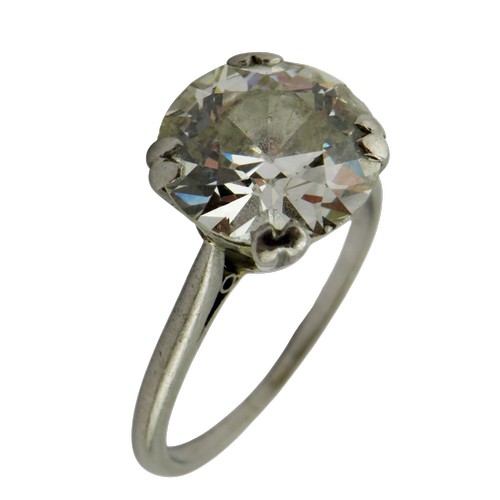 8 - A diamond solitaire ring, the early modern round brilliant approx. 3.25cts, in a twin four-claw sett... 