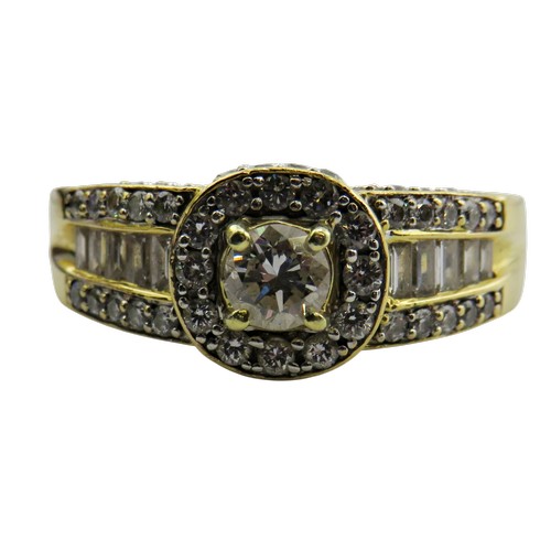 31 - A vintage Continental gold and diamond cluster dress ring, centred with a round brilliant diamond ap... 