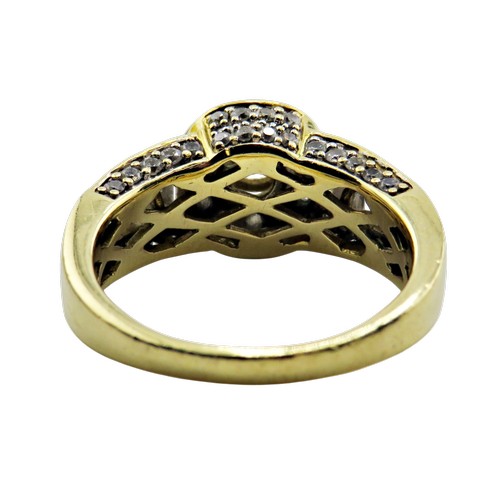 31 - A vintage Continental gold and diamond cluster dress ring, centred with a round brilliant diamond ap... 