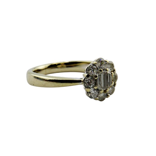 33 - An 18ct white gold and diamond oval cluster ring, centred with three bevel-edged baguette-cut diamon... 