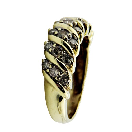 35 - A vintage gold and diamond half-eternity ring, the 21 small round brilliants grain set in trios with... 