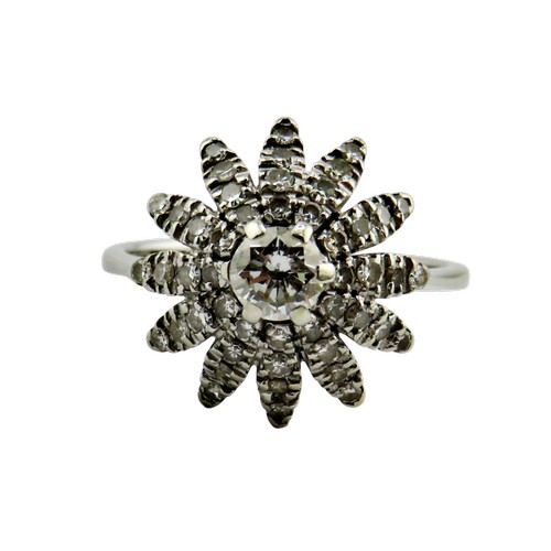 36 - An 18ct white gold and diamond flower-head cluster ring, centred with a round brilliant approx. 0.25... 