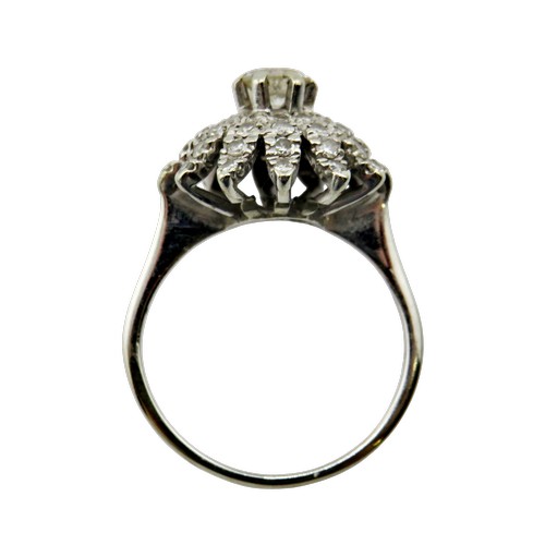 36 - An 18ct white gold and diamond flower-head cluster ring, centred with a round brilliant approx. 0.25... 