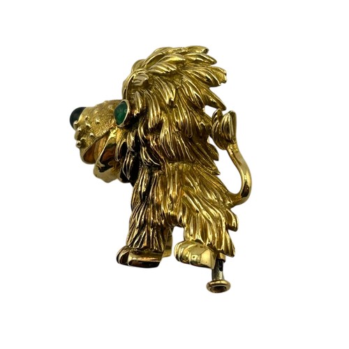 3A - Cartier - French gold and gem amusing lion brooch, number 945243, with a cabochon emerald eye and a ... 