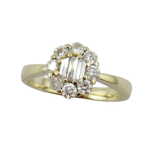 33 - An 18ct white gold and diamond oval cluster ring, centred with three bevel-edged baguette-cut diamon... 