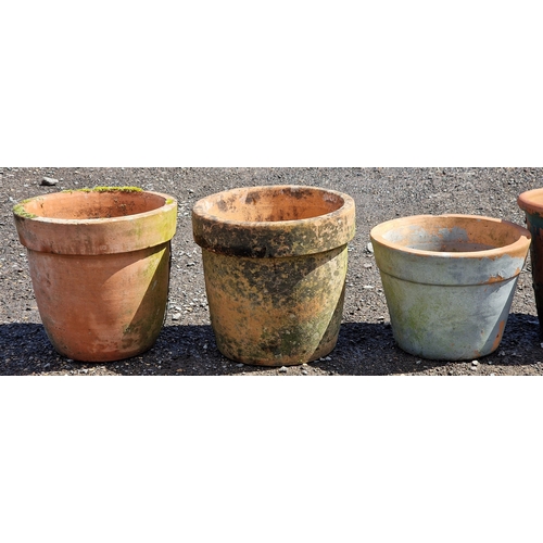 12 - Nine terracotta planters of various size and design, largest H 34cm x W 35cm (9)