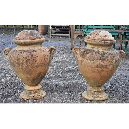 18 - Pair of terracotta twin handled lidded urns, H 60cm x W 47cm (2)