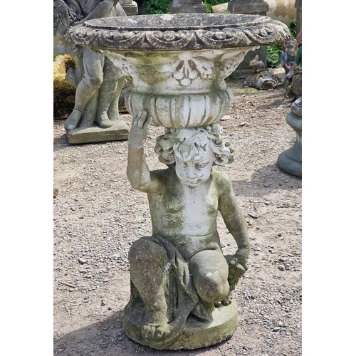 34 - Pair of weathered reconstituted stone garden urns with lobed bowls and foliate swag detail, raised o... 