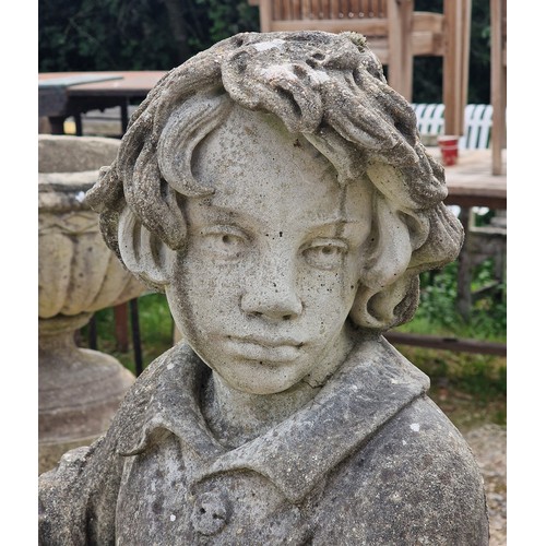 35 - Haddonstone - Weathered reconstituted stone statue of a boy holding a basket of grapes, H 117cm x W ... 