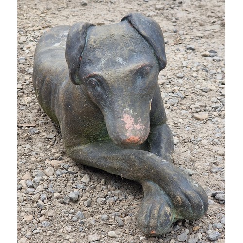 36 - Reconstituted stone bronzed effect statue of a recumbent hound, H 25cm x W 57cm x D 15cm