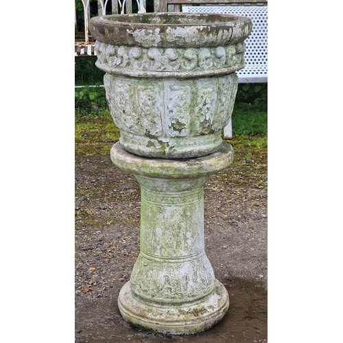 47 - Pair of reconstituted stone garden planters with foliate detail and distressed paintwork, raised on ... 