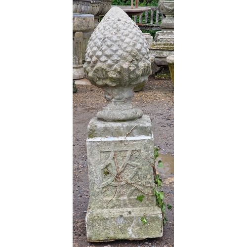 51 - Set of five weathered reconstituted stone pineapple finials raised on square cut plinths with fielde... 