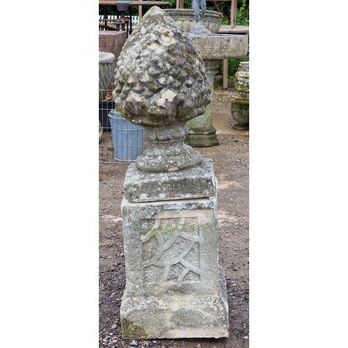 51 - Set of five weathered reconstituted stone pineapple finials raised on square cut plinths with fielde... 