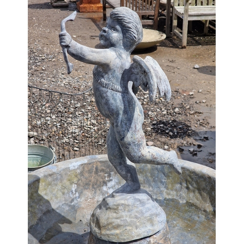 52 - Weathered reconstituted stone bird bath with lead lined bowl raised on an octagonal column, surmount... 