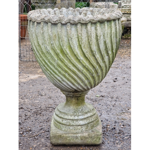 53 - Set of four weathered reconstituted stone garden urns with spiral twist bowls, H 65cm x W 46cm (4)