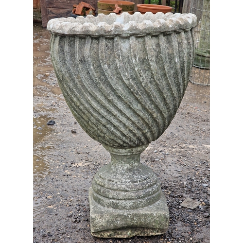 53 - Set of four weathered reconstituted stone garden urns with spiral twist bowls, H 65cm x W 46cm (4)