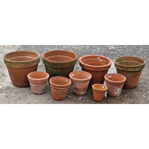 55 - Nine terracotta pots of various size and design, largest H 30cm x W 35cm (9)