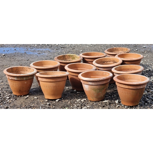 60 - Set of twelve terracotta pots with incised Greek key detail, H 23cm x W 31cm (12)
