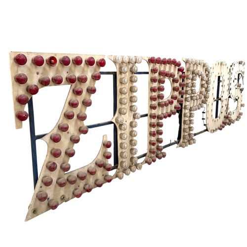 1 - Zippos Circus - An enormous ' ZIPPOS ' illuminating wall sign, metal framed, H 100cm x W 400cm appro... 