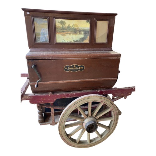 59 - A. Tomasso & Son of Southgate - An early 20th century crank-operated barrel piano / organ, with pain... 