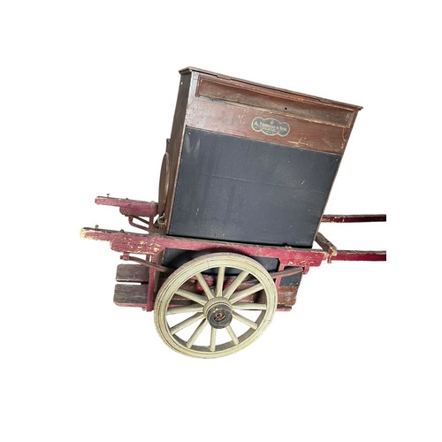 59 - A. Tomasso & Son of Southgate - An early 20th century crank-operated barrel piano / organ, with pain... 