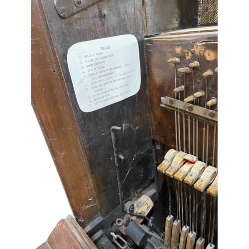 59 - A. Tomasso & Son of Southgate - An early 20th century crank-operated barrel piano / organ, with pain... 
