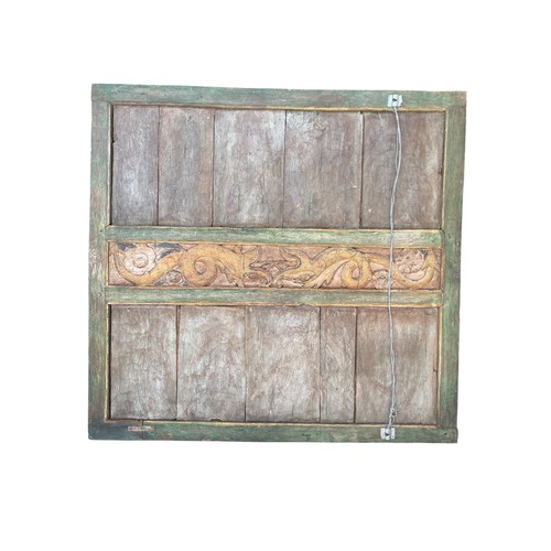 31A - Fairground / folk art - A large early 20th century painted and carved wooden panel, possibly Indian,... 