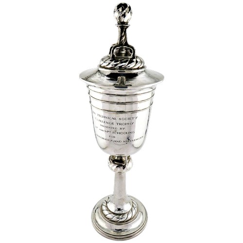 1930s Omar Ramsden large silver chalice or cup and cover, typical wrythen fluted finial and hammered bowl, inscribed 'Ibis Technical Society Challenge Trophy, Presented by Mr & Mrs Schooling for Fine Embroidery and Needlework', London 1930, H 40cm, 801g