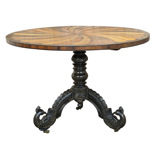 19th century carved Anglo Portuguese ebonised tilt top table with spiralled design specimen wood top and scrolled peacock supports, H 77cm x W 109cm

Contents of a Moreton-in-Marsh mansion