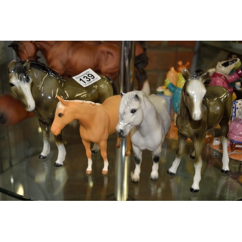 139 - Set of four Beswick gloss horses incl Palomino and grey