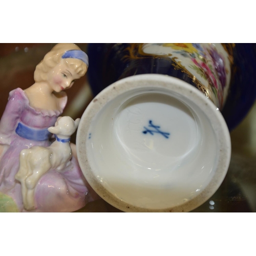 159 - Meissen blue and floral gilt edged trumpet vase and Doulton figure