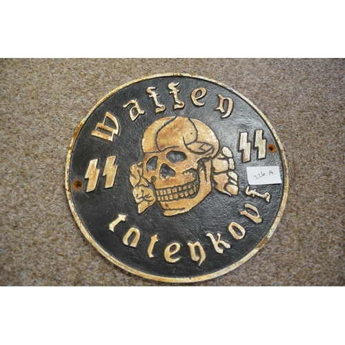 226a - Circular 55 Nazi cast iron 'Waffen' plaque