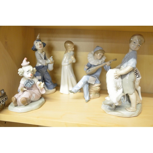 267 - Group of five Nao porcelain clowns, jesters and children