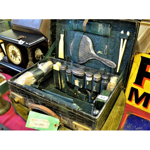 53 - Antique Gentleman's travel/dressing case with halmarked silver bottles and dust jacket.