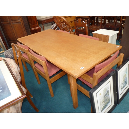 712 - Oak dining table and chairs